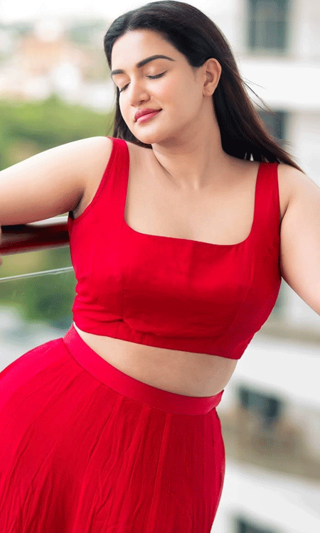 Honey Rose Fiery Red Elegance and Malayalam Stardom