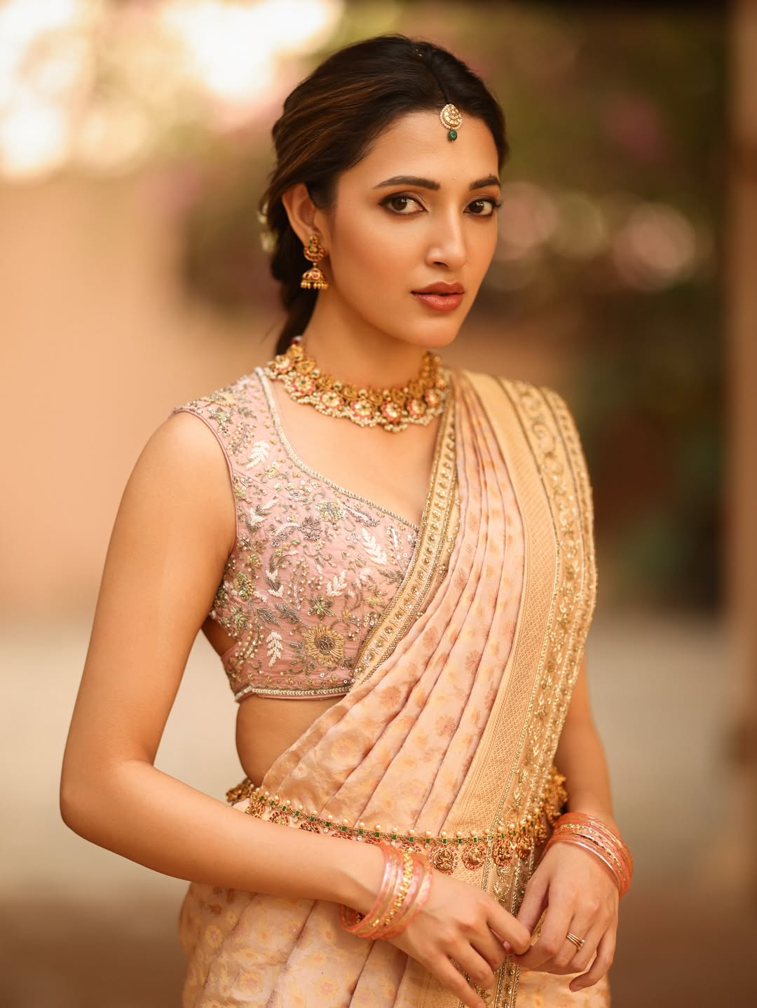 Neha Shetty Stuns in Peach Saree with Timeless Elegance Neha Shetty Stuns in Peach Saree with Timeless Elegance