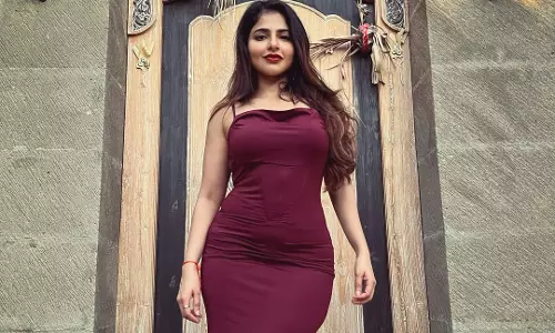 Iswarya Menon Stuns in Maroon Satin Gown with Elegant Glam