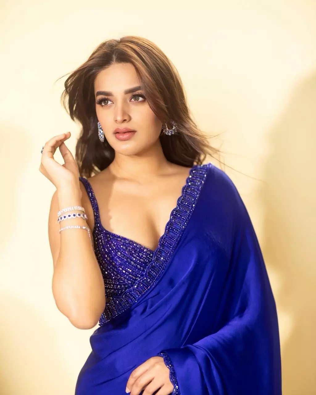 Nidhhi Agerwal Shines in Mesmerizing Blue Glam Look Nidhhi Agerwal Shines in Mesmerizing Blue Glam Look