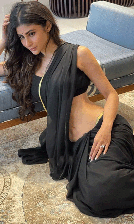 Mouni Roy Stuns in Bold Black Saree Look, Exudes Glamour and Confidence