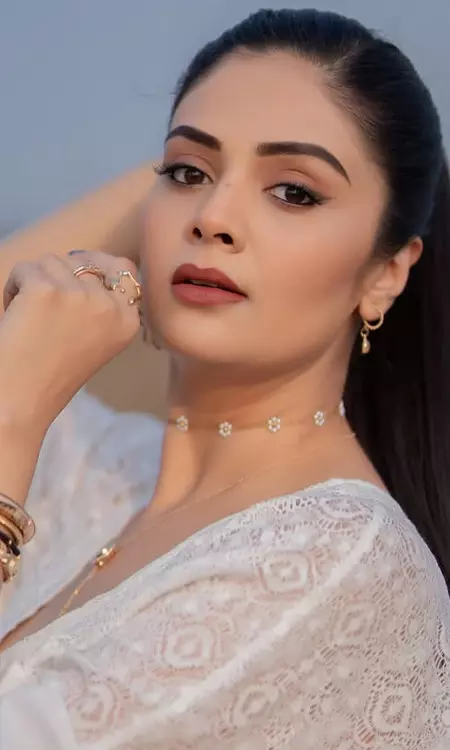 Sreemukhi Shines in Elegant White Minimal Glam Look