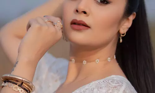 Sreemukhi Shines in Elegant White Minimal Glam Look