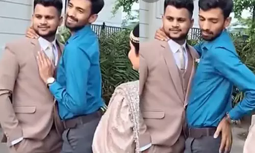 పర్ఫెక్ట్ ఫోటో కోసం ఫోటోగ్రాఫర్ తిప్పలు.. వీడియోకి నెటిజన్స్ ఫిదా!