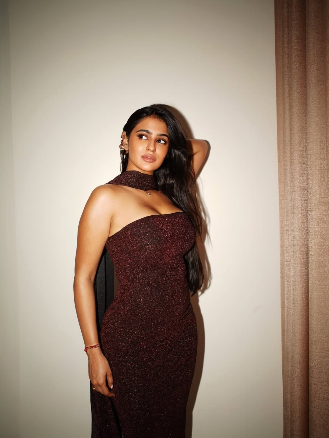 Prakriti Pavani Turns Heads in Shimmering Maroon Glam Look Prakriti Pavani Turns Heads in Shimmering Maroon Glam Look