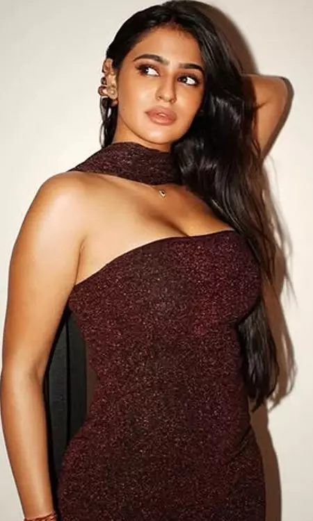 Prakriti Pavani Turns Heads in Shimmering Maroon Glam Look