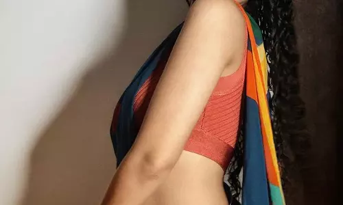 Curly-Haired Beauty Anupama Stuns in New Photo Collection