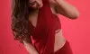 yashika aanand stuns in bold red saree look with glamorous style