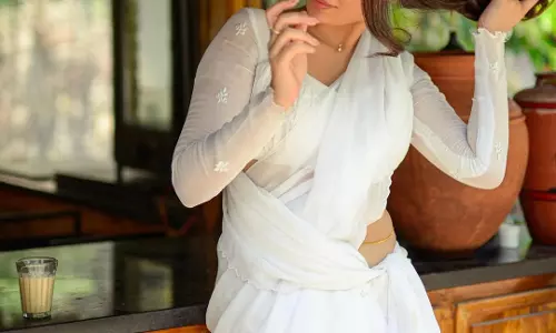 Kushita Kallapu Athiloka Sundari Style In White Saree