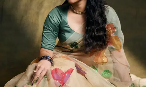 Kayadu Lohar Stuns in Elegant Beige Saree Photoshoot with Ethereal Beauty