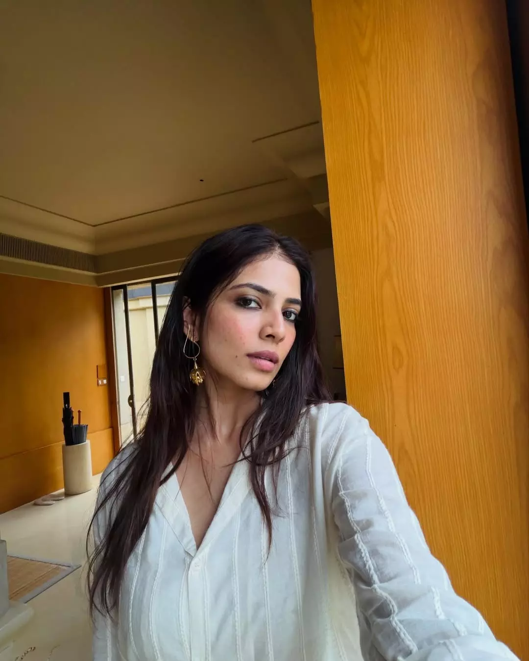 Malavika Mohanan Stuns in Minimal Chic Look on Indonesia Trip Malavika Mohanan Stuns in Minimal Chic Look on Indonesia Trip