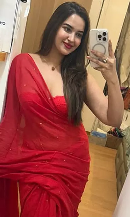 Pujita Ponnada Stuns in Red Saree Mirror Selfie