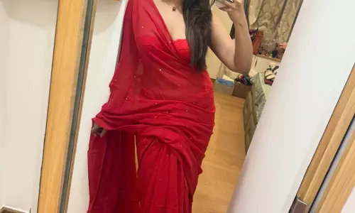 Pujita Ponnada Stuns in Red Saree Mirror Selfie