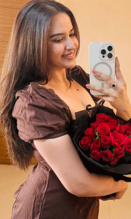 Pujita Ponnada Stuns in Elegant Brown Midi Dress in Chic Mirror Selfie