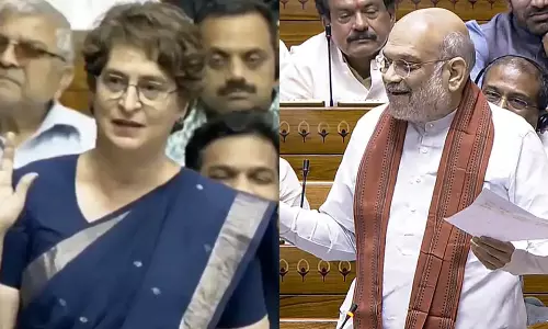 ప్రియాంక సెటైర్లు...అమిత్ షా నవ్వులు