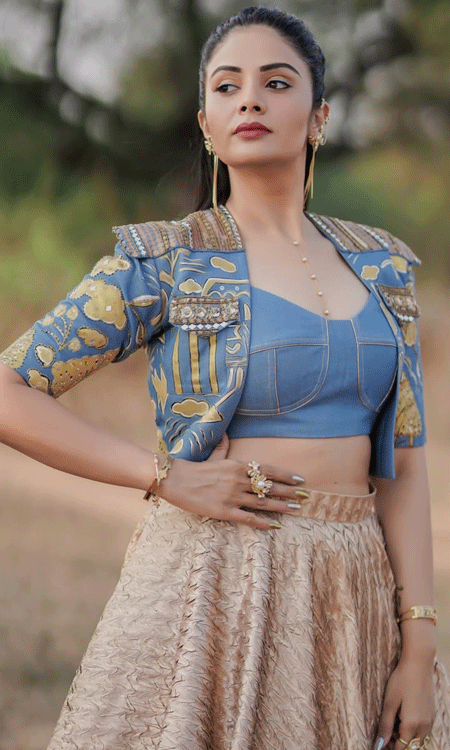 Sreemukhi Stuns in Blue and Gold Lehenga, Radiates Regal Elegance