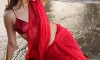 Prisha Rajesh Singh Stuns in Red Saree Beach Look with Sun Kissed Glow