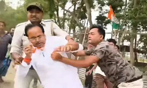 బీజేపీ అభ్యర్థిని వెంటాడి కొట్టిన తృణమూల్ కార్యకర్తలు.. బెంగాల్ లో తీవ్ర ఉద్రిక్తత