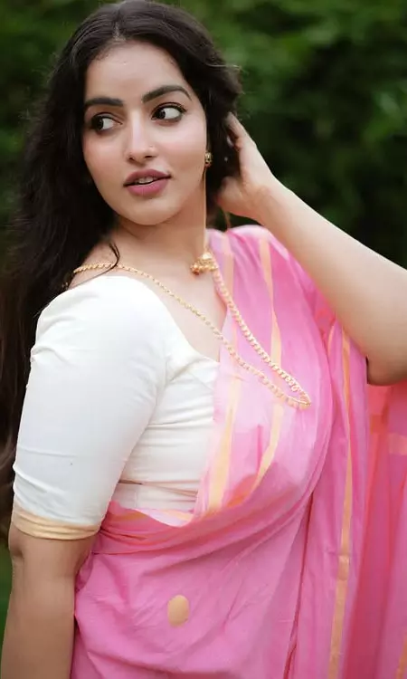 Malavika C Menon Stuns in Elegant Pink Saree Look