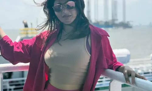 Iswarya Menon radiates peace in pink co-ord set by the sea