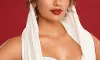 White Magic on Crimson: Tejaswi Madivadas Portrait