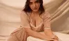 Neha Sharma Stuns in Elegant Beige Dress, Radiates Sensual Charm