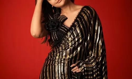 Payal Rajput Stuns in Black & Gold Saree Elegance