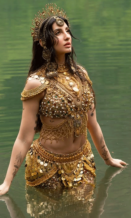 Nora Fatehi’s Golden Water Goddess Look Is All Over Social Media