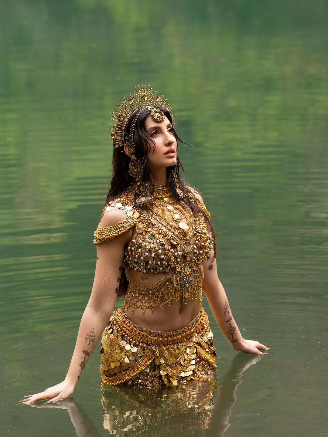 Nora Fatehi’s Golden Water Goddess Look Is All Over Social Media