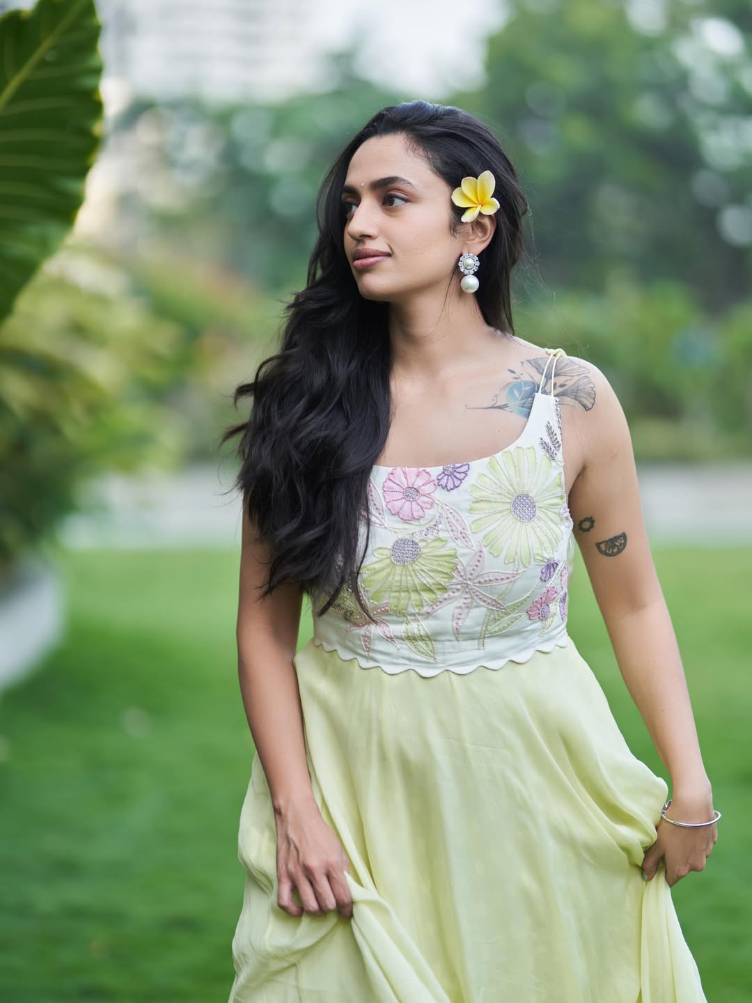 Malavika Nair Glows in Yellow Floral Outfit with Natural Grace
