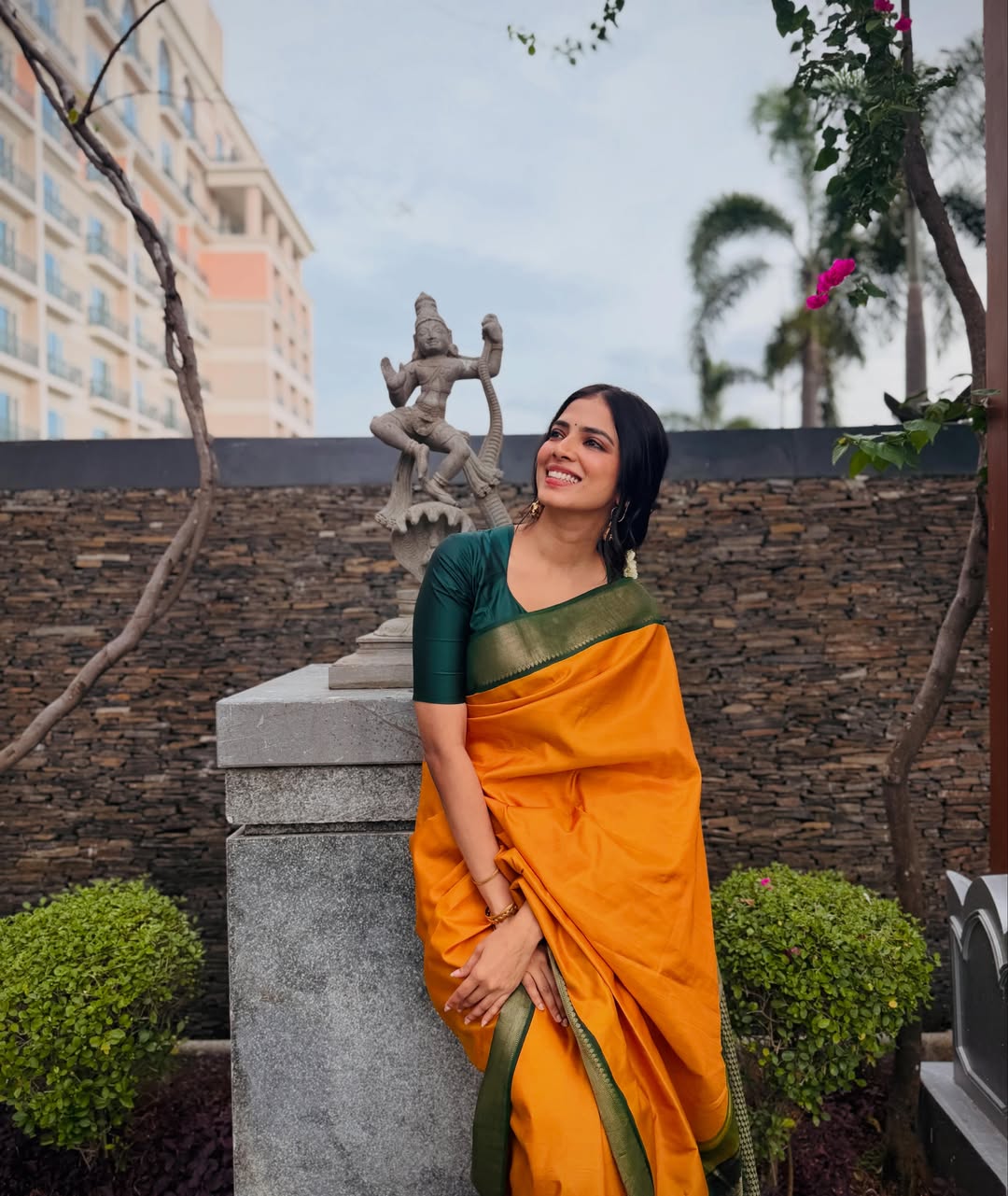Malavika Mohanan Lights Up Chennai in Vibrant Orange Saree