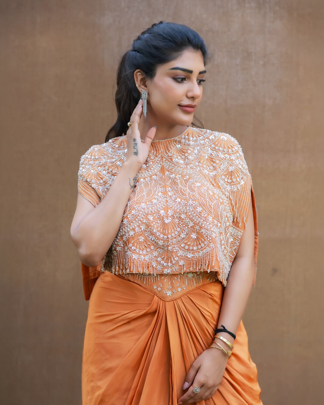 Bandaru Supritha: Wrapped in Orange Elegance