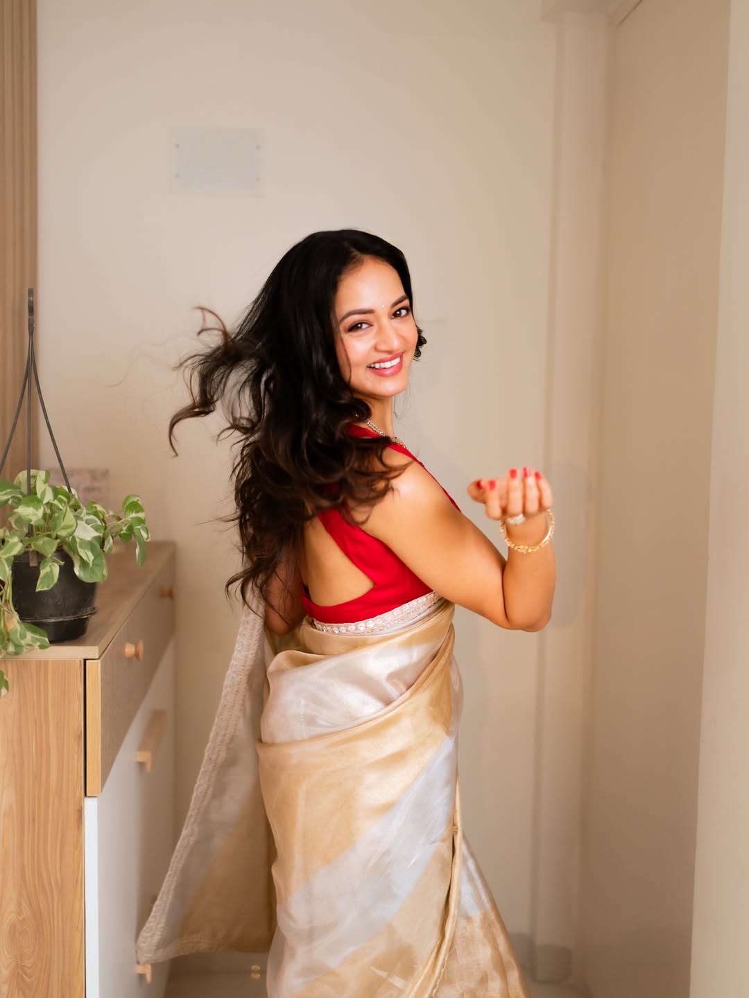 Shanvi Srivastava Stuns In Glamorous Gold Saree With Festive Elegance