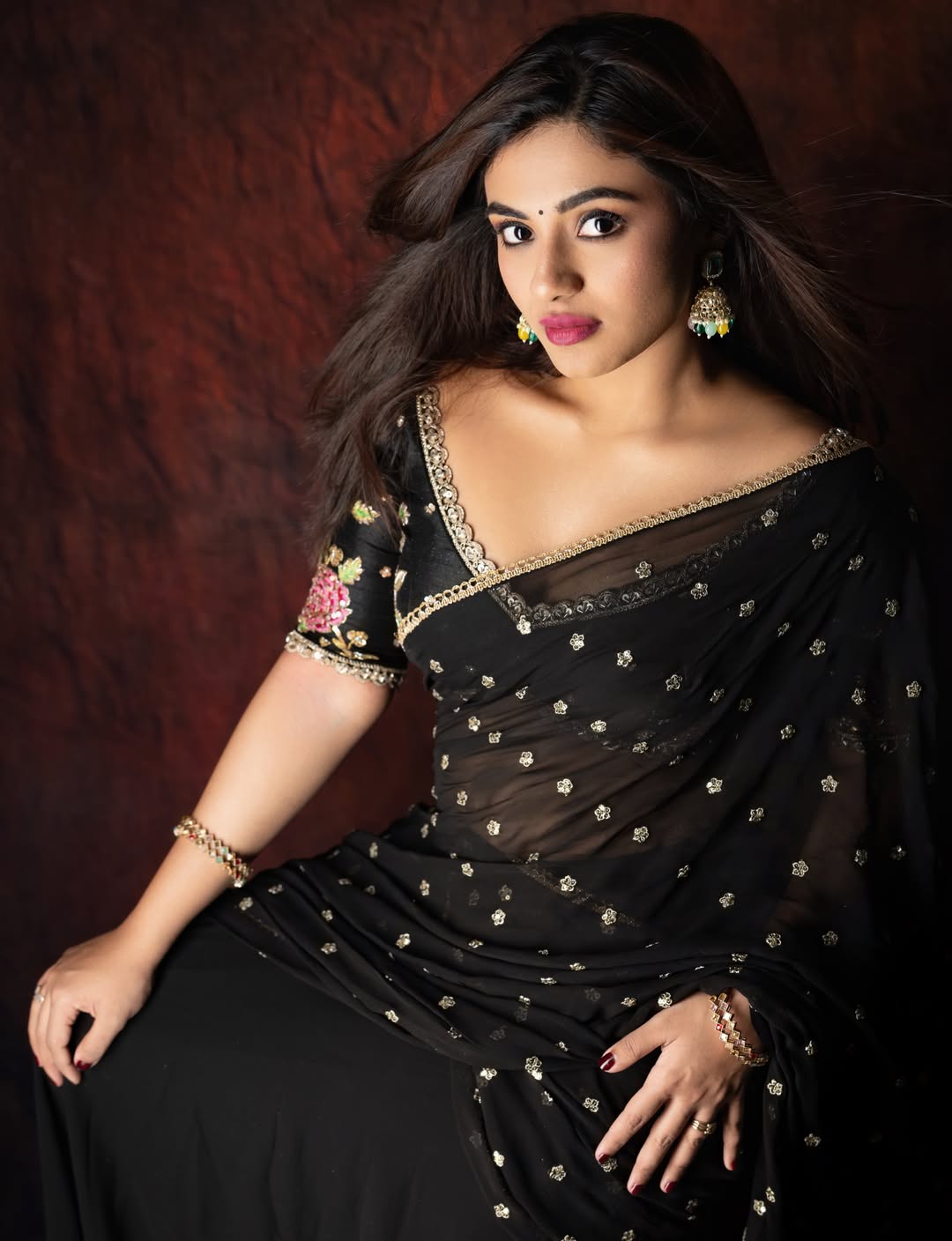 Nayan Sarika Stuns in Elegant Black Saree Photoshoot