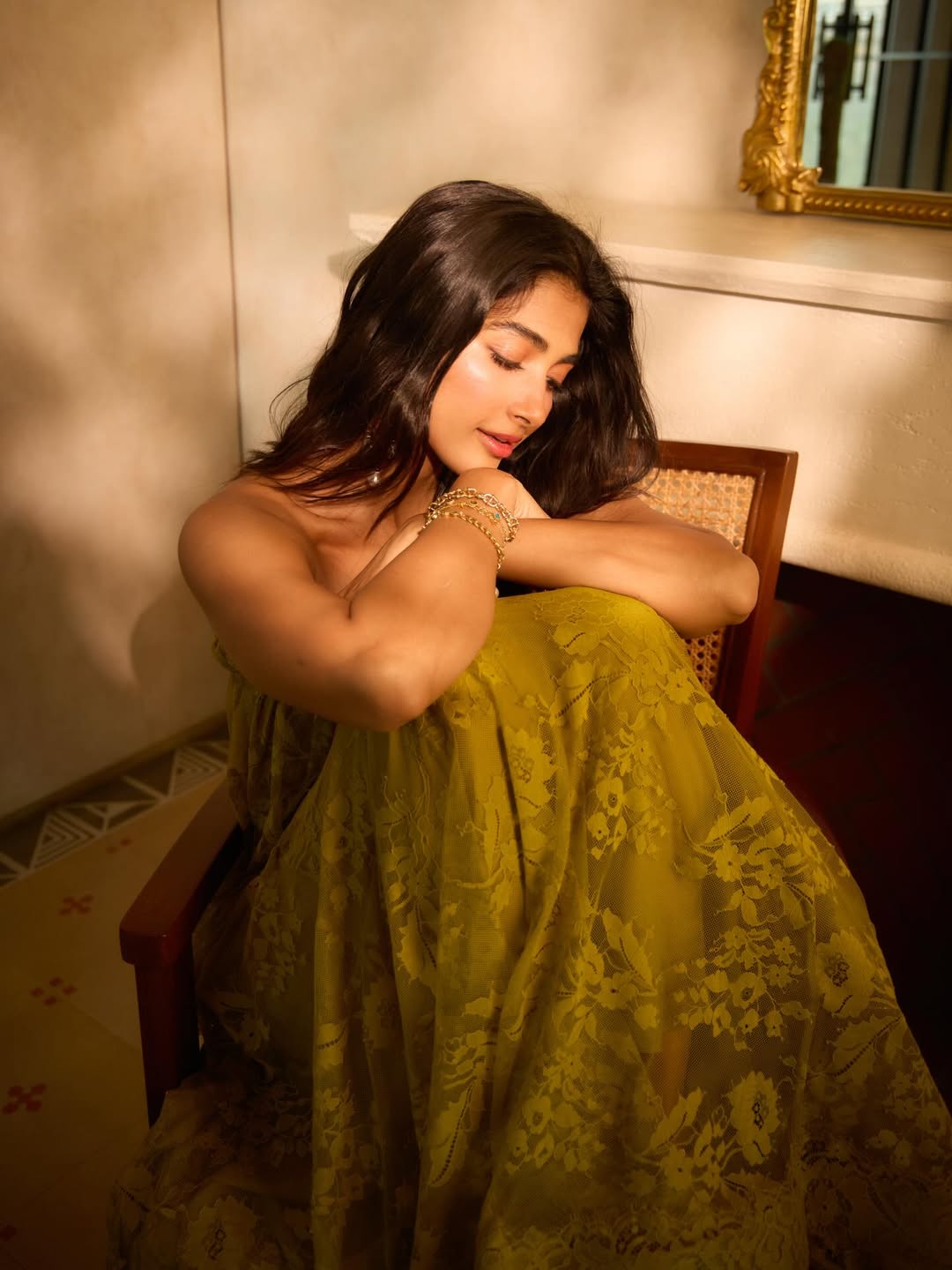 Pooja Hegde Captivates in Sheer Floral Lace and Golden Light