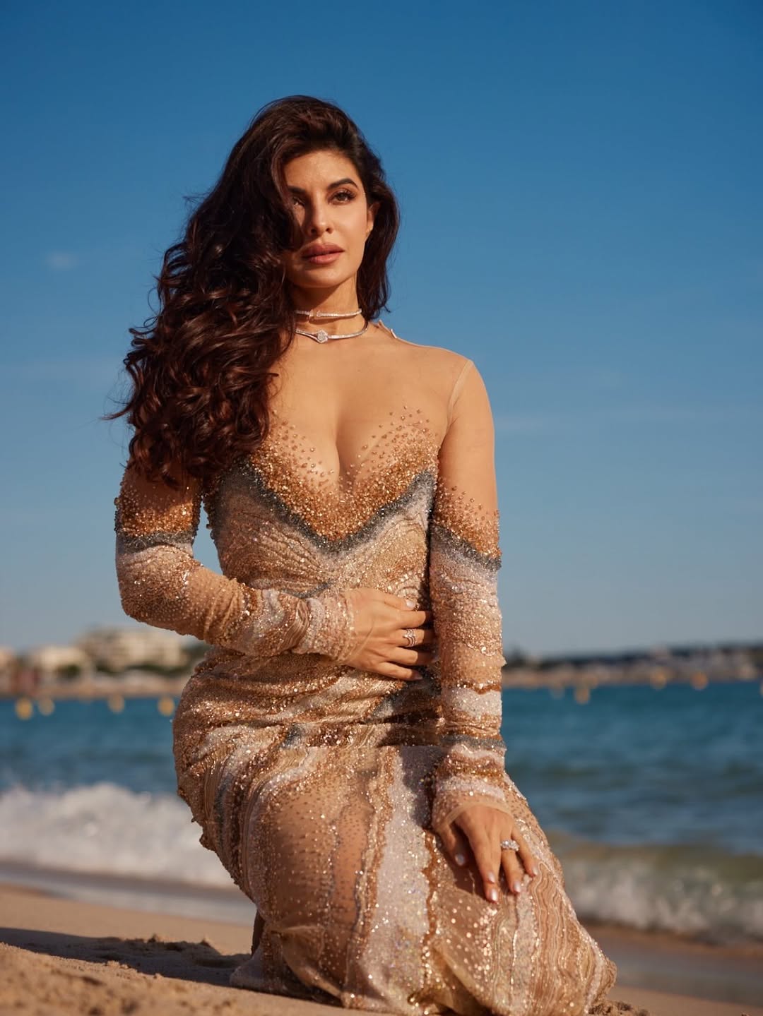Jacqueline Fernandez Stuns in Golden Gown Beach Photoshoot