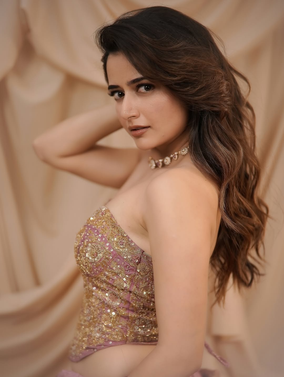 Ashika Ranganath Stuns In Glittering Gold Glam At Chittara Star Awards