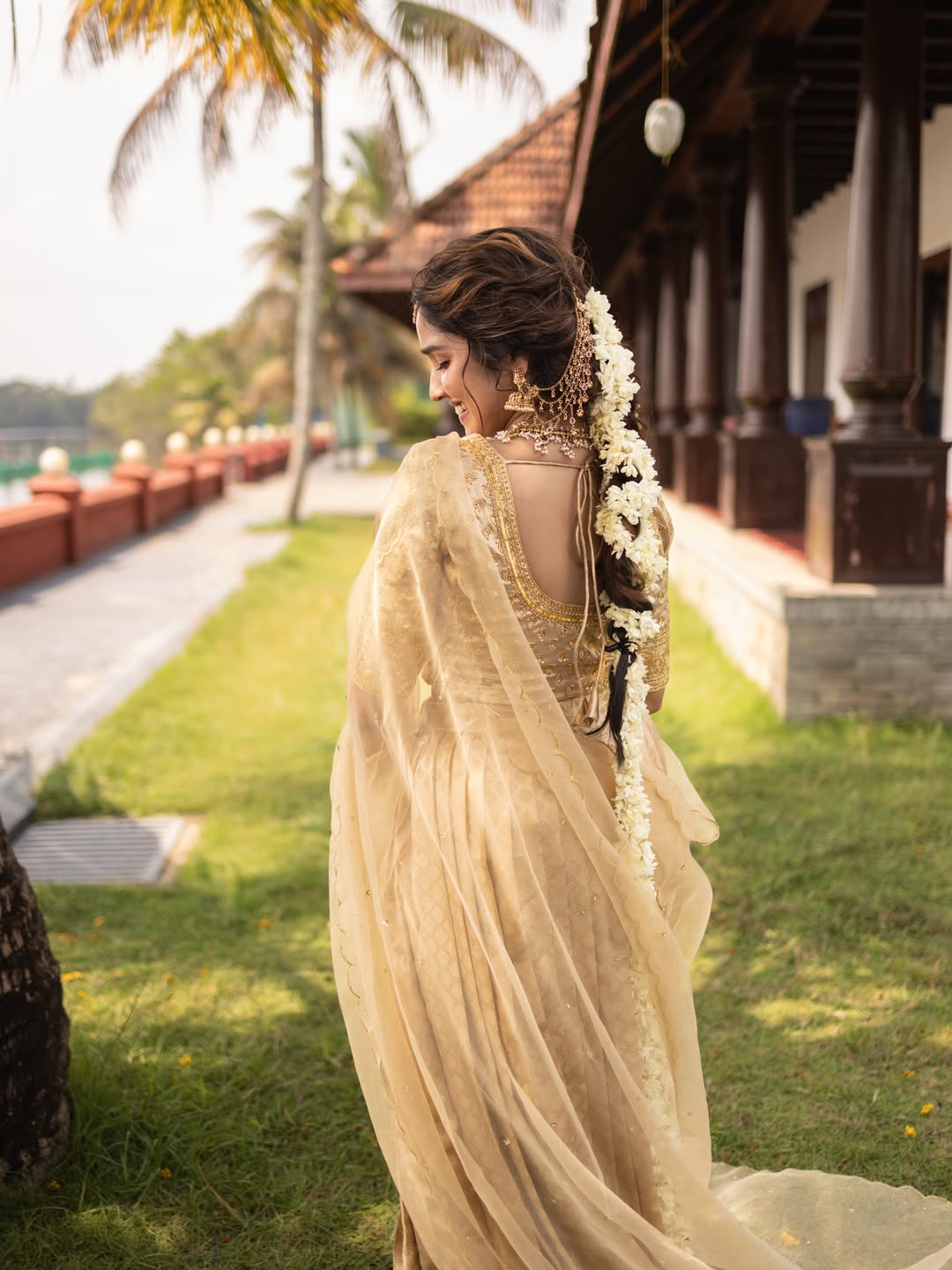 Anikha Surendran Stuns In Golden Traditional Look At Old Lake House