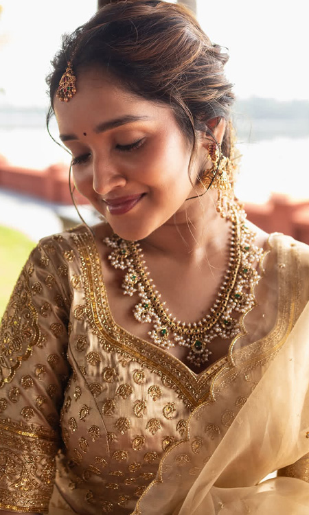 Anikha Surendran Stuns In Golden Traditional Look At Old Lake House