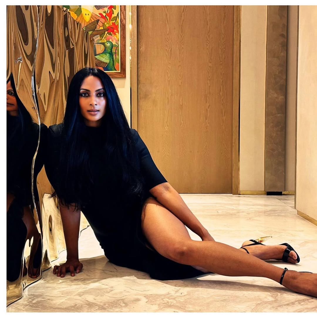 Sriya Reddy Stuns In Bold Black Midi Dress With High-Slit Glam Look