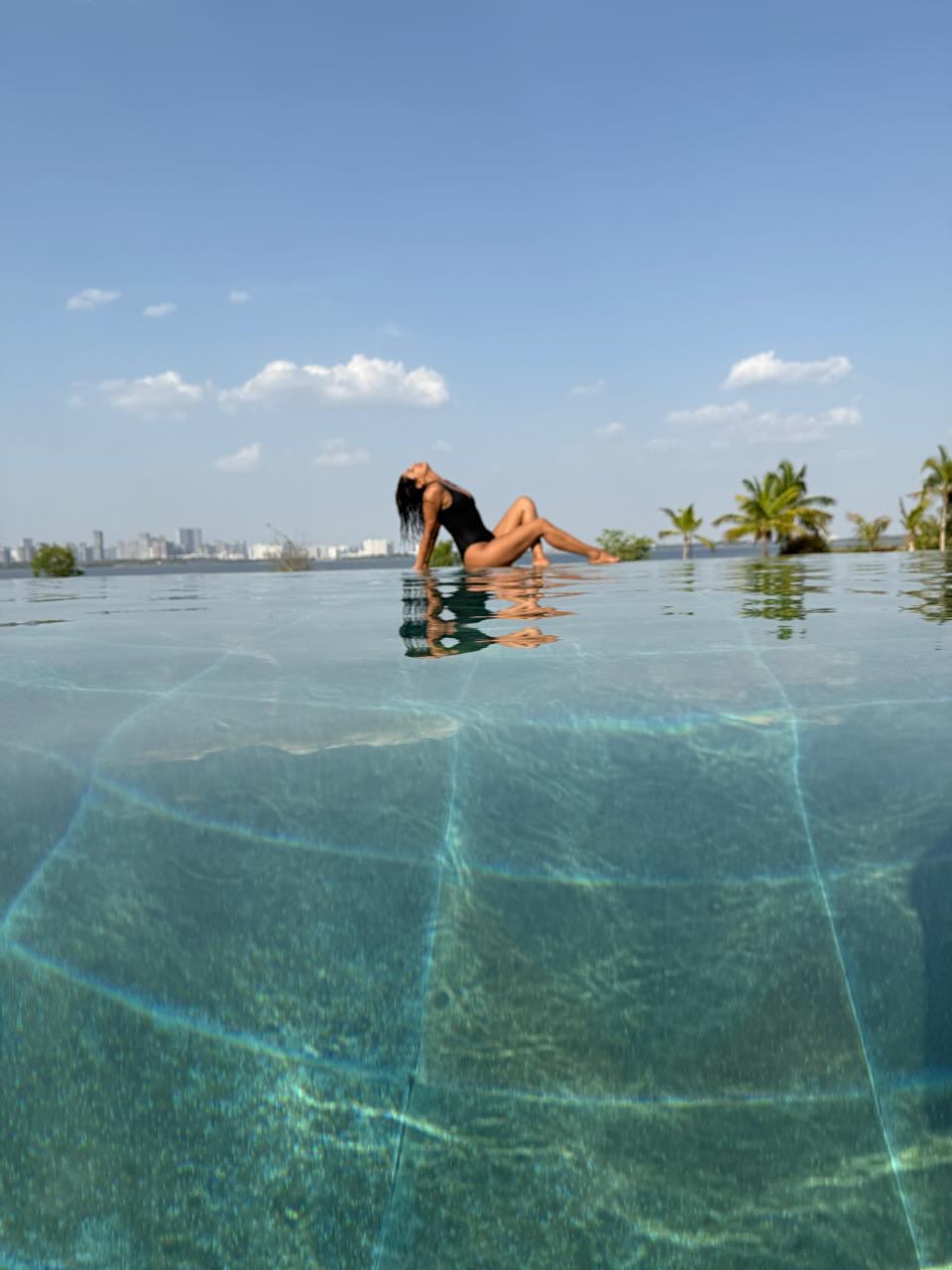 Priyanka Chopra’s Mesmerizing Infinity Pool Glow in Black Swimsuit