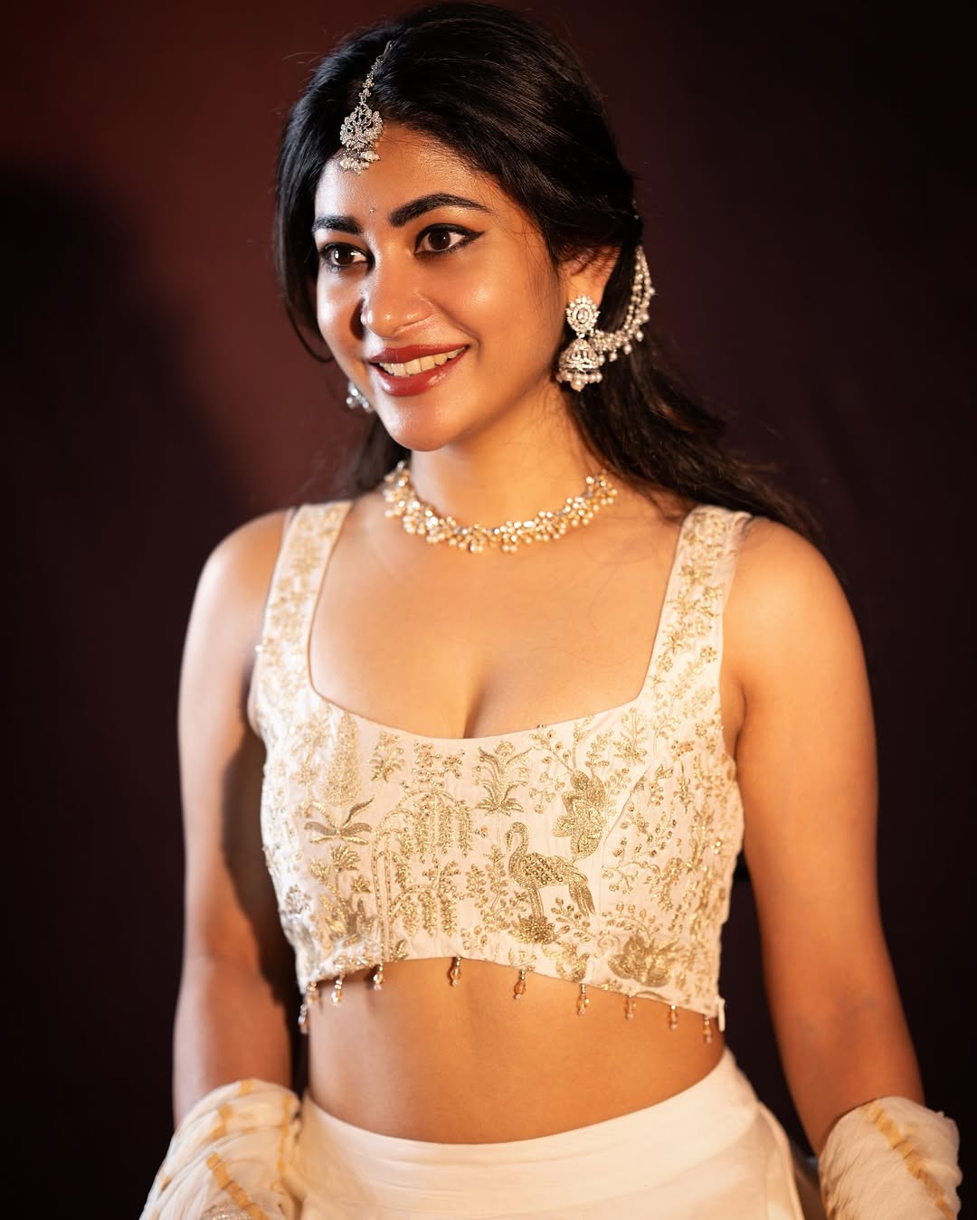 Sonu Thakur Captivates in White and Gold Ensemble