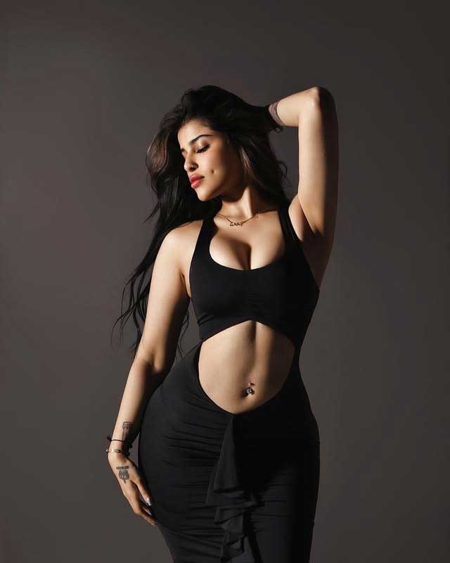 Edin Rose Stuns in Bold Black Cut-Out Glam Studio Look