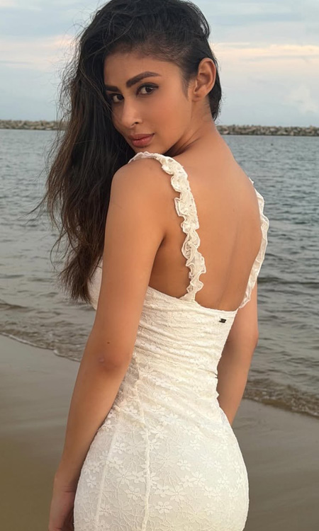 Mouni Roy Stuns in Sunset Beach Look Wearing Elegant White Lace Dress