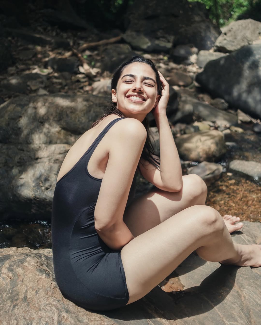 Meenaakshi Chaudhary Radiates Joy in Nature-Inspired Forest Swimsuit Look