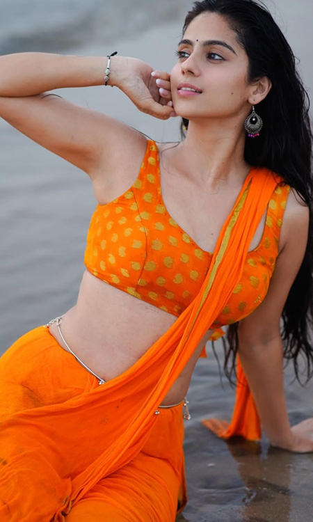 Rose Sardhana Stuns in Orange Saree Beach Look with Effortless Glamour