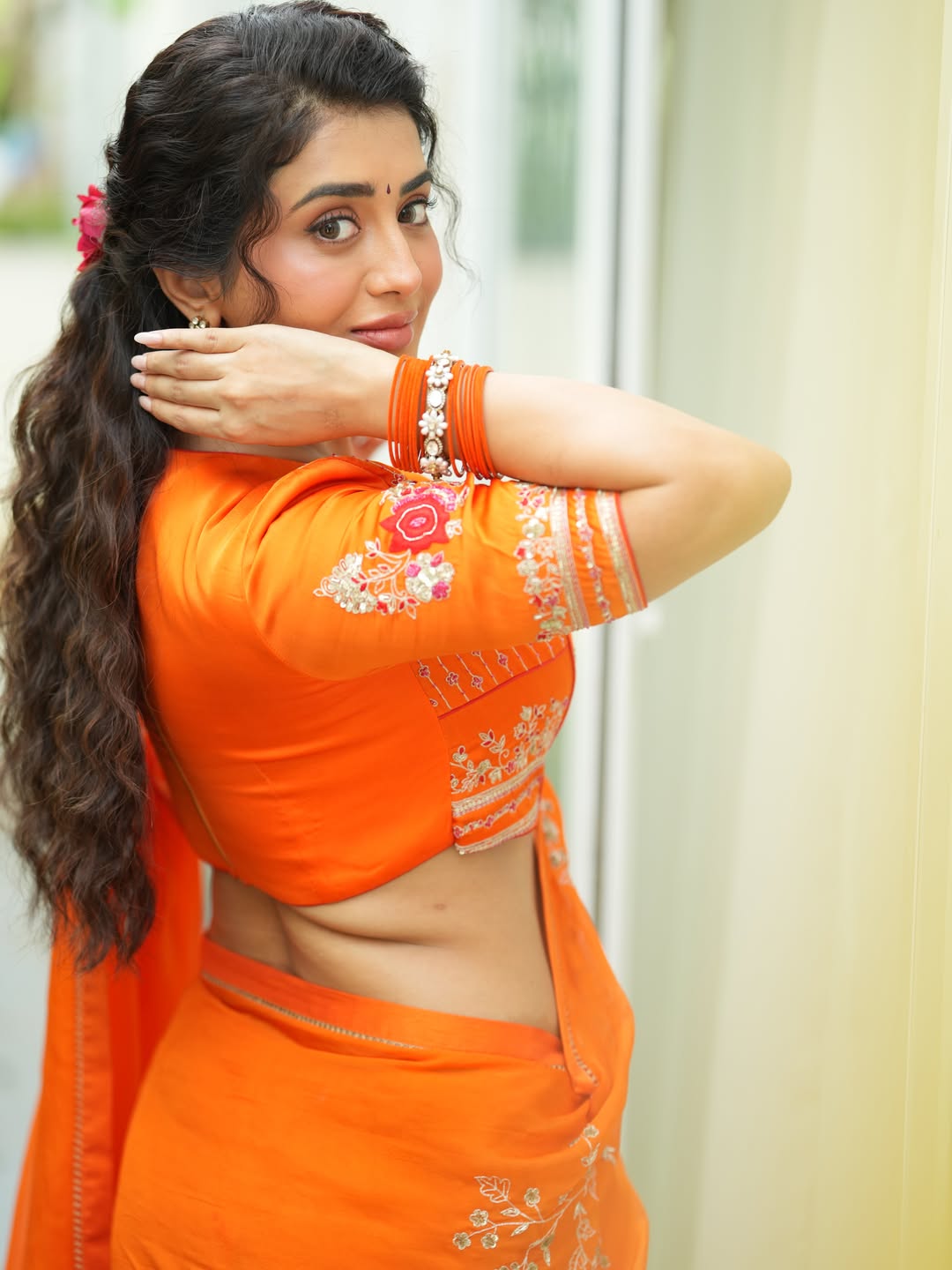 Orange Elegance Rashi Singh’s Stunning Traditional Glow