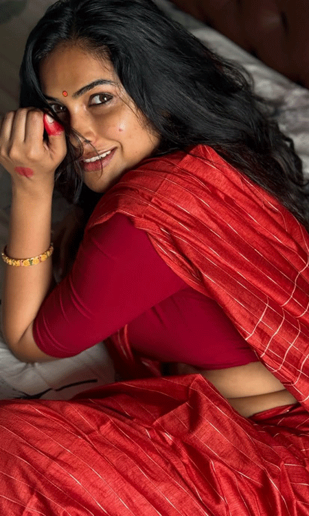 Divi Vadthya Radiates Elegance in Romantic Red Saree