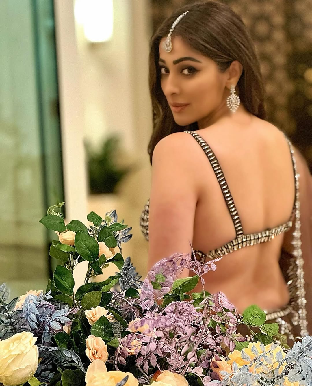 Raai Laxmi Stuns in Embellished Backless Outfit in Glamorous Photoshoot