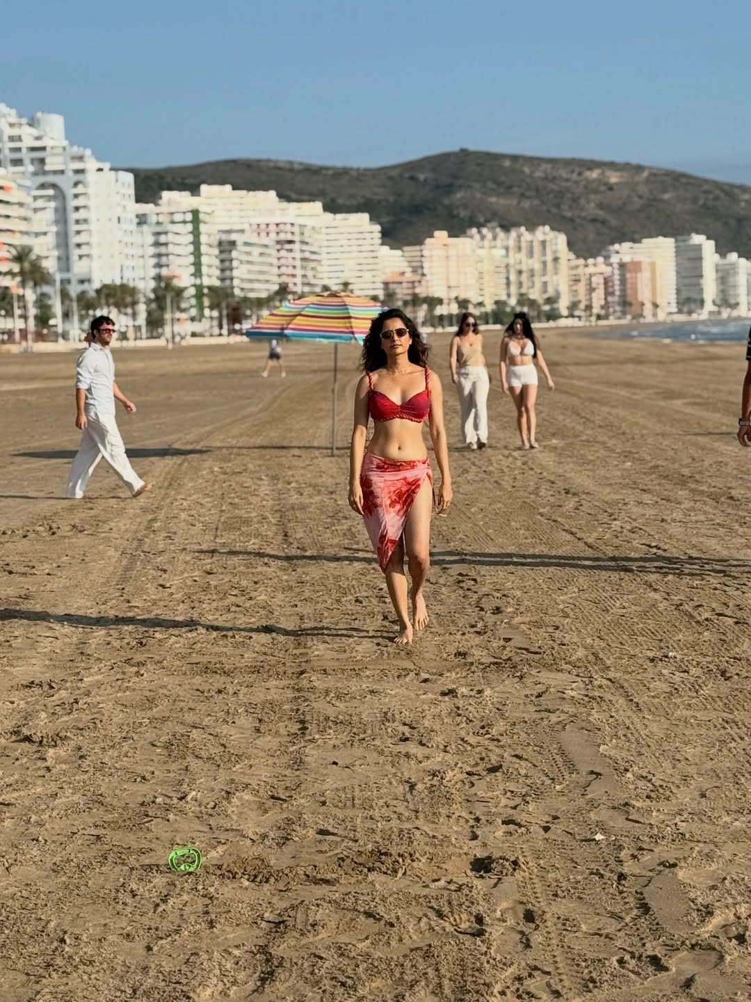 Ashika Ranganath Stuns in Beach Shoot Showcasing Her Bold Glam Avatar